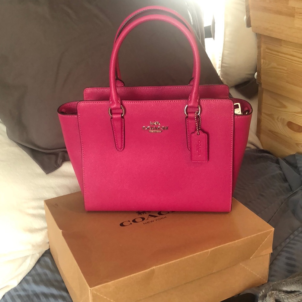 Brand new never used pink Coach Purse
